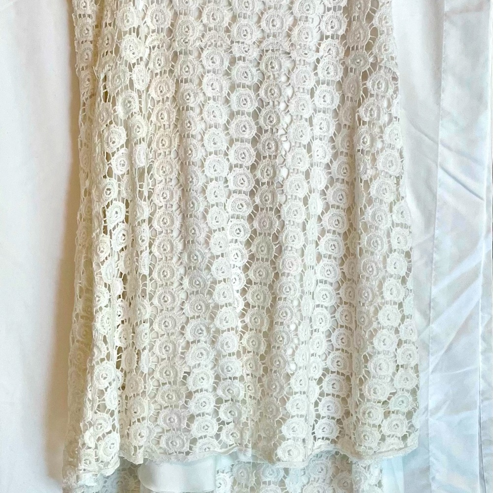 White House Black Market, crocheted, white lined skirt, size 4
